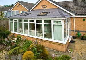 A Conservatory renovation with a Tiled roof in Tapco Slate a lightweight roofing material