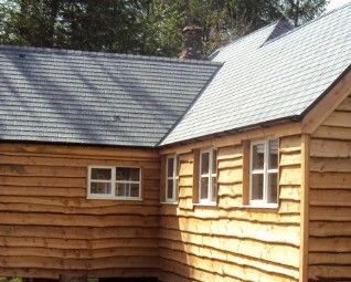 Chalet roof in lightweight Grey Tapco Slate lightweight roofing options